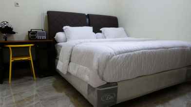 Kamar Tidur 4 Family 2 Bedroom at Omah Kuning Homestay