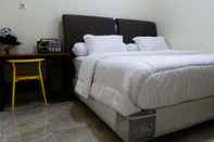 Kamar Tidur Family 2 Bedroom at Omah Kuning Homestay