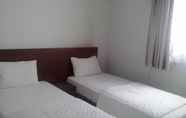 Kamar Tidur 5 Zameena Guesthouse