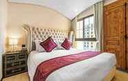Bedroom 6 Venetian Suites By Favstay