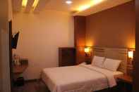 ห้องนอน Salvator Hotel Palembang