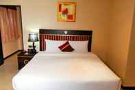 Kamar Tidur Lucky Palace Hotel