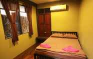 Kamar Tidur 6 Viman Guesthouse