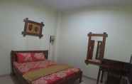 BEDROOM Spacious Room at Omah Gandok 