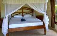 Kamar Tidur 3 Warung Pantai Bungalows