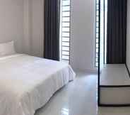 Phòng ngủ 6 Adamas Apartment - Phan Dang Luu