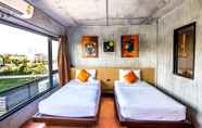 Kamar Tidur 4 B2 Mahidol Boutique & Budget Hotel