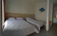 Bedroom 6 In Out Hotel Pangandaran