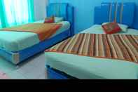 Kamar Tidur Golden Rain Hotel