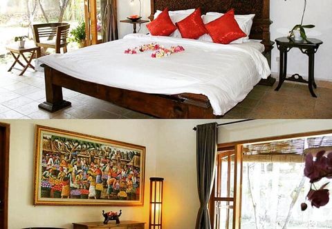 Bedroom The Ning Beachfront & Villa