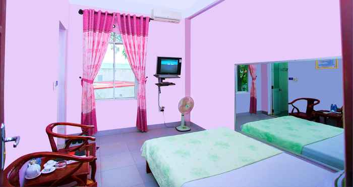 ห้องนอน Quang Minh Guesthouse