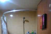 In-room Bathroom Buah Batu Apartment Bandung by Putri