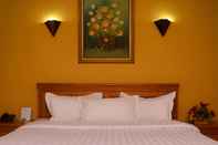 Bedroom Dhaksina Hotel Medan