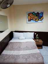 Kamar Tidur 4 City Corner Hotel