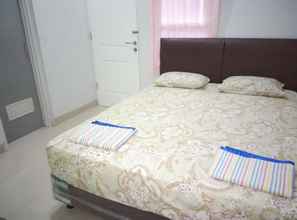 Kamar Tidur 4 Puri Phunix Guest House Babarsari