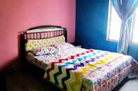 Bedroom RuQita Home Stay