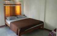 Bilik Tidur 4 OYO 93359 Kawi Homestay