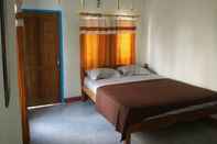 Bedroom OYO 93359 Kawi Homestay