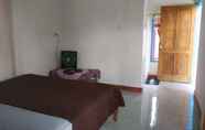 Kamar Tidur 3 OYO 93359 Kawi Homestay