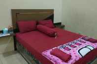 Bedroom Greenville Hotel Mitra RedDoorz