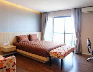 Bedroom 2 Kanyarat Lakeview Condominium by Wilai Jumpaphan