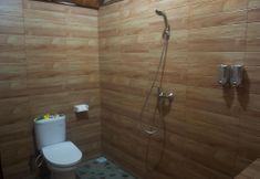 In-room Bathroom 5 The Sandat Bungalow