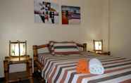 Bilik Tidur 2 Squares Beachfront Apartments