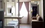 Kamar Tidur 4 The Suites Metro By Madam King Pro