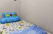 Bedroom 3 Budget Homey Apartment in Puri
