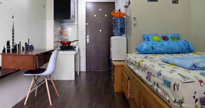 Kamar Tidur Budget Homey Apartment in Puri