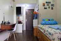 Kamar Tidur Budget Homey Apartment in Puri