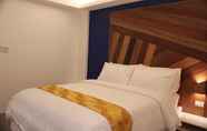 Kamar Tidur 2 G Executive Hotel and Spa