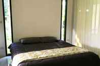 Bedroom Ranong PK Guest House and Studio
