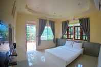 ห้องนอน Baanpufa Resort