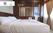 Phòng ngủ 4 Bed and Bath Serviced Suites