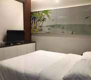 ห้องนอน 7 Bed and Bath Serviced Suites