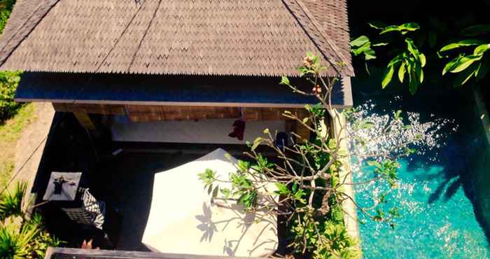 Kamar Tidur Bunga Desa Villa Balangan