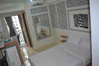 Bedroom Apartemen Green Lake View by Property Time