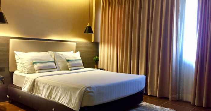 Kamar Tidur Home Crest Hotel