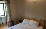 Phòng ngủ 2 Hana Riverside Villa
