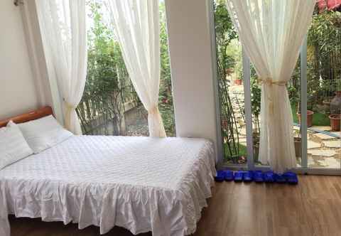 Phòng ngủ Rose Homestay