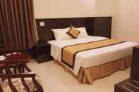 Kamar Tidur Lucky Star Hotel