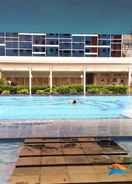 SWIMMING_POOL Green Pramuka City Apartment by Amicale Room 01