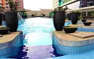 SWIMMING_POOL Green Pramuka City Apartment by Amicale Room 01