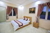 Kamar Tidur Ven Song Riverside Hotel