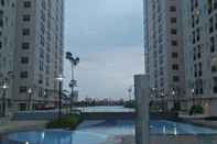 Swimming Pool Violet Room at Kota Ayodhya