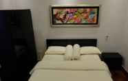 Kamar Tidur 4 Pujis Homestay