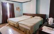 Kamar Tidur 4 Crowne Garden Hotel