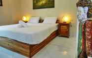 Kamar Tidur 4 Sweet Bungalow Hotel 