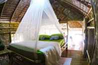 ห้องนอน Baan Jingjai Homestay Resort